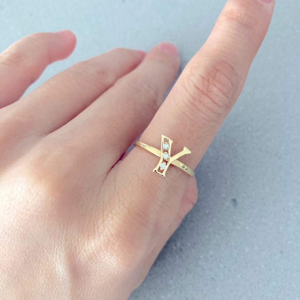 14k yellow gold diamond ring.